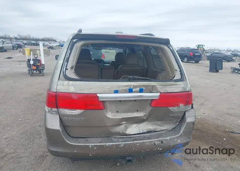 2010 Honda Odyssey Touring z USA, uszkodzony, nr VIN 5FNRL3H90AB047535